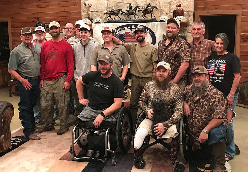 happy veterans group inside lodge