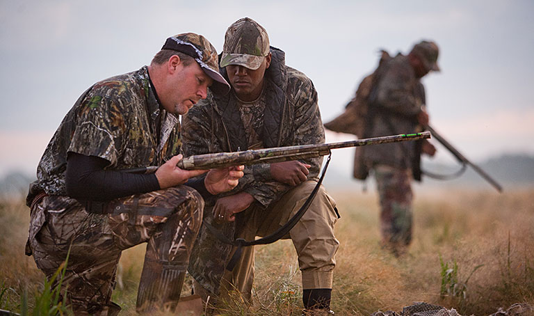 Veterans heroes checking weapons